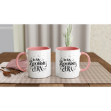In My Bookish Era white ceramic mugs with pink inside on a table, perfect for coffee or hot drinks.