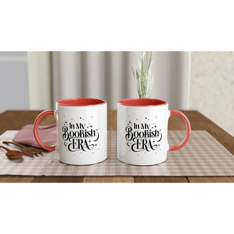 In My Bookish Era white ceramic mugs with colored inside on a table, perfect for coffee or hot beverages.