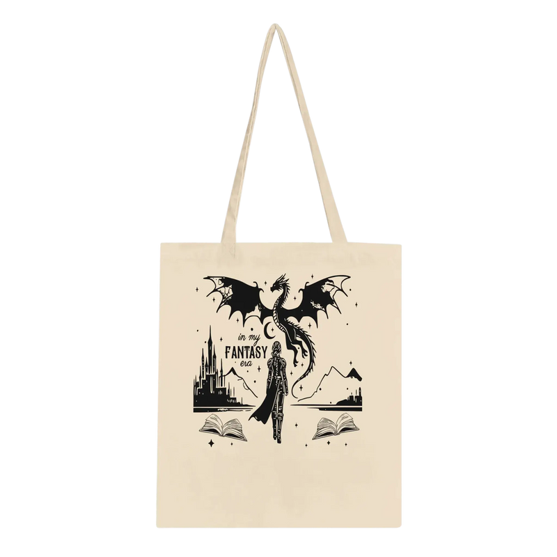 In My Fantasy Era tote bag featuring a dragon, castle, and mountains design on eco-friendly cotton fabric.