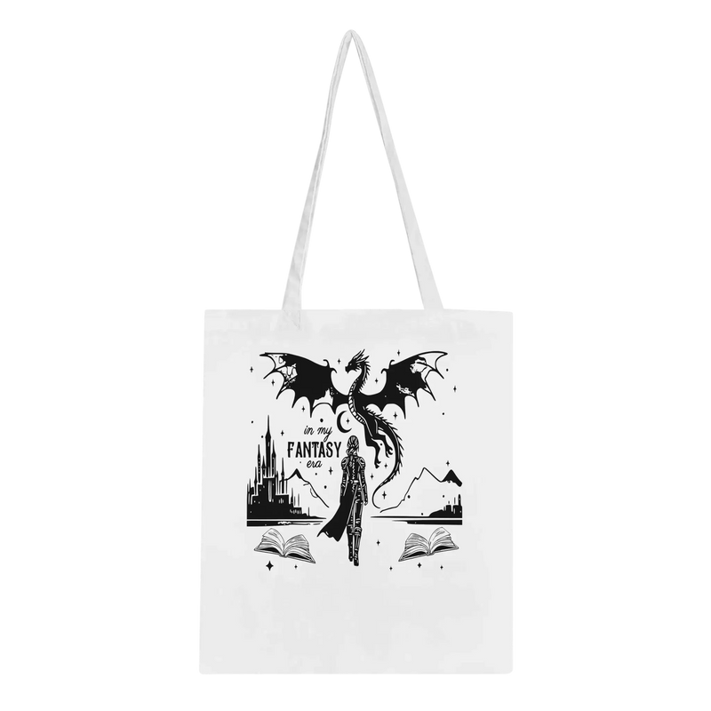 In My Fantasy Era tote bag featuring a dragon, books, and a mystical landscape design on eco-friendly fabric.